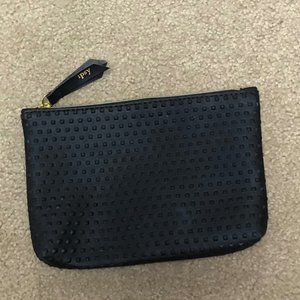 Black textured makeup bag